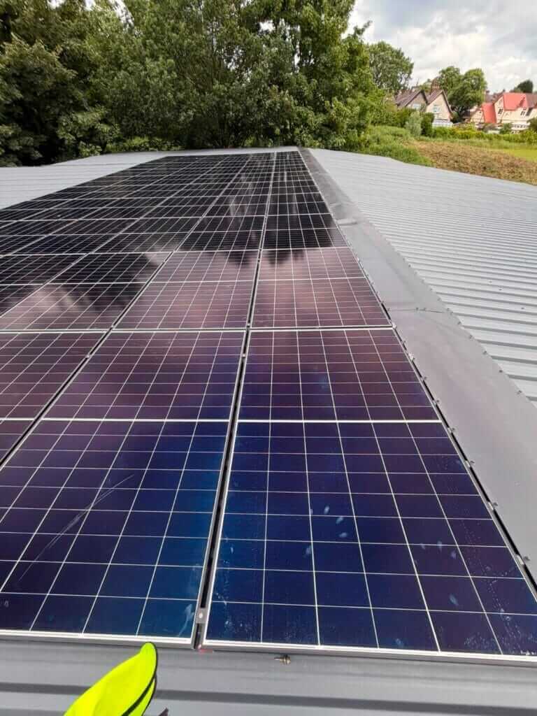 Solar panel array installed on a metal roof