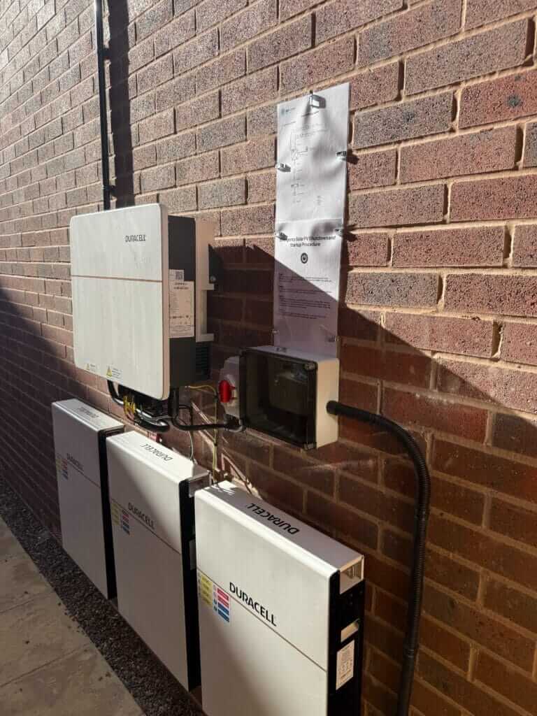 Duracell battery storage system installed on a house wall