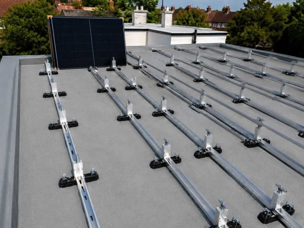Solar mounting rails installed on a flat commercial roof