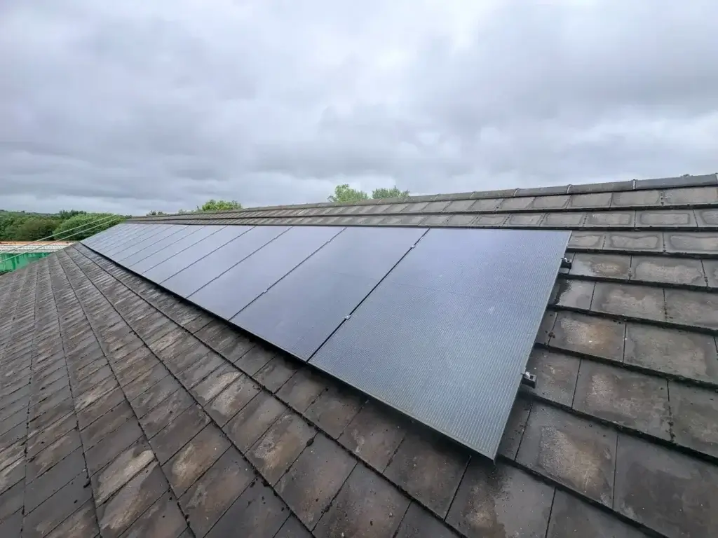 Solar panel array installed on a slate roof by Ashware Electrical, Cannock